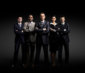 business team standing over a dark background