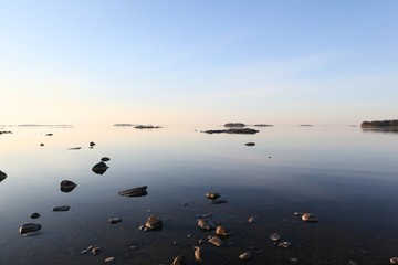 Gulf of Finland at sunrise with seashore and rock details