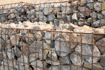 Many of the stones are in the grating .for protective embankment collapses