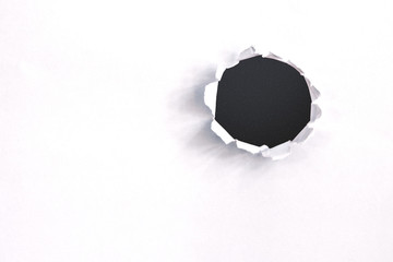 Hole in the paper with torn.Hole in the paper