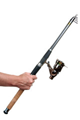 new spinning rod in hand on a white isolated background