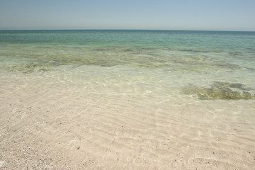 Fototapeta na wymiar Clear Blue Sea and Beach in Kuwait