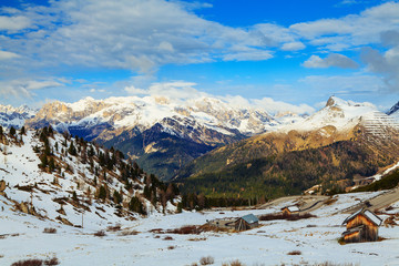 The snow-covered peaks of the Dolomites in early spring.