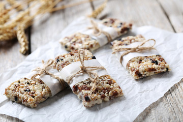 Granola bar on a grey wooden table