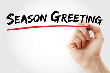Hand writing Season greeting with marker, holiday concept background