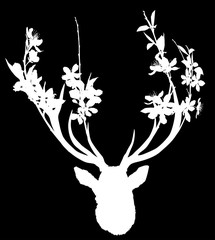 white deer head with blossoming branches between antlers