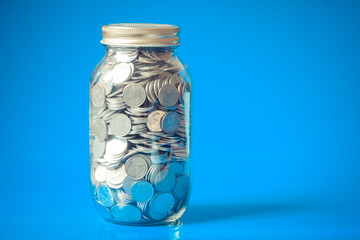 save money for investment concept money in the glass with filter