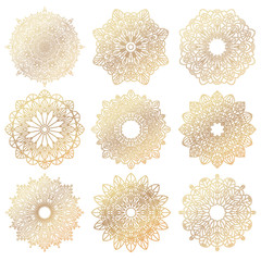 Set of gold mandalas. Geometric circle element made in a vector. It can be used for different type design, birthday and other holiday, color book, T-shirts, medallions, yoga, India, Arabic