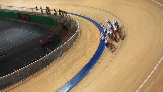 cycling race sharp turn blurred motion sequence