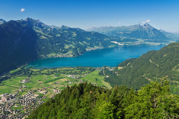 Fototapeta na wymiar Beautiful idyllic Alps landscape with lake and mountains in summer, Switzerland 