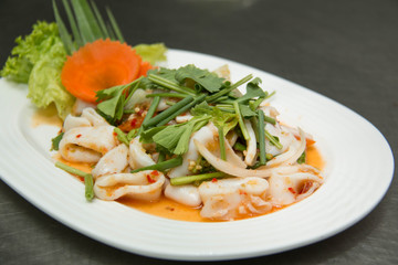  Squid salad on the white plate