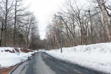 Fototapeta premium Snowy road at morning