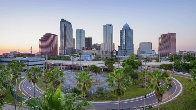 Tampa, Florida, USA downtown time lapse skyline from day to night.