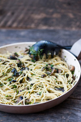 Italian pasta with mushrooms and pesto