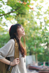 Naklejka premium Asian girl in the park