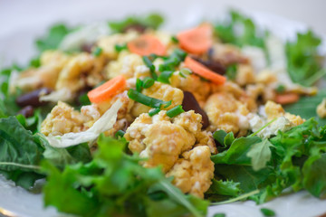 Vegetable omelet with mixed salad leafs