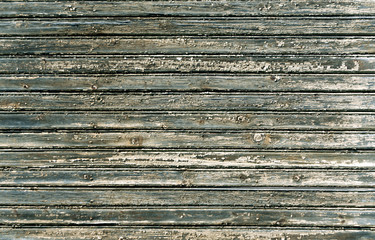 Weathered wooden house wall texture.