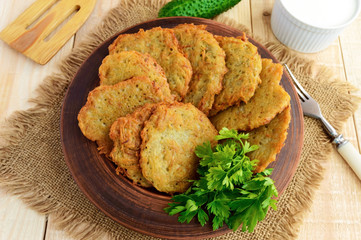 Village vegetarian pancakes made from potatoes in a clay bowl. 