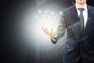 Double exposure of businessman hand showing technology key to success