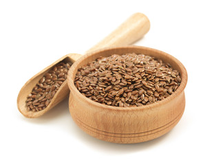 flax seeds in bowl on white