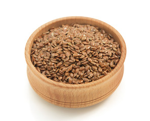 flax seeds in bowl on white
