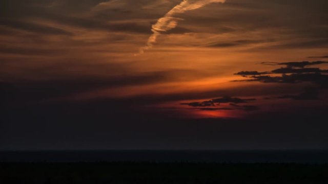 beautiful sunset clouds golden hour of the sun setting field nature timelapse