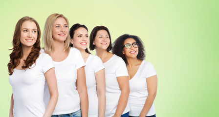 group of happy different women in white t-shirts