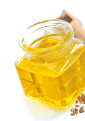 linseed oil in bottle isolated on white