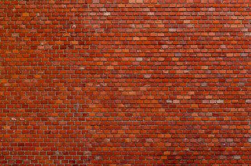 Old red brick wall background with copy space