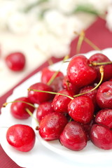 Sweet cherry on a plate