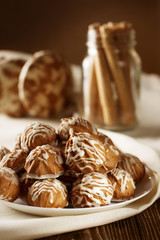 Different kinds of cookies. Brown cookies with frosting