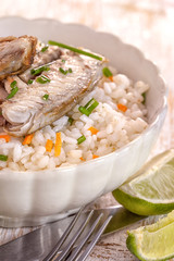 Grilled fillet of herring on rice