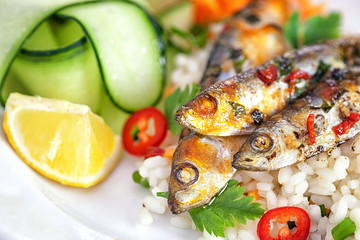Grilled sardines with zucchini and lemon