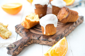 Fresh orange muffins with sugar fondant
