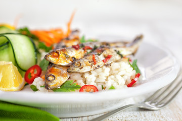 Grilled sardines with zucchini and lemon