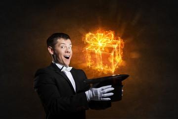Man magician with cylinder hat