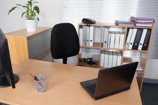 Office desk with laptop job business concept