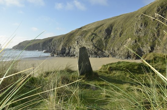 stone marker at perran sands beach