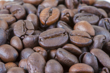 Stack closeup coffee bean background.
