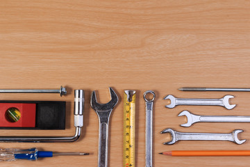 Engineer tools, wrench tools on wood table.