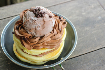 Stack of Homemade Pancakes with Chocolate Ice-Cream Scoops