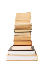 Fototapeta premium Libros apilados con fondo blanco aislado. Vista de frente