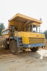 Fototapeta na wymiar Big yellow mining truck