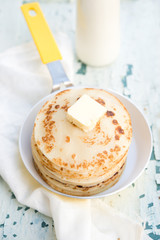 Pancakes with a butter slice
