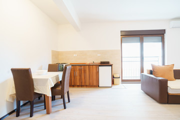 Interior of a guest house room with kitchen