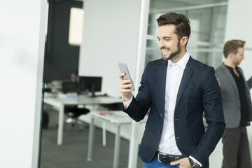 Fototapeta premium Businessman with a phone
