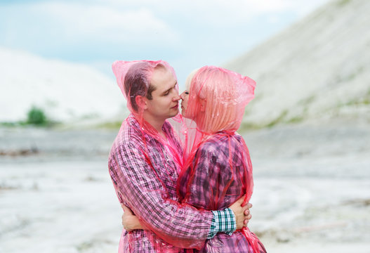 The man and the woman embrace.