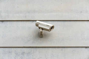 Close-up of security camera on building