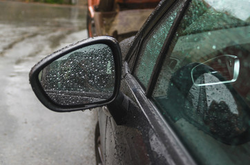 Close-up of car in rainy weather