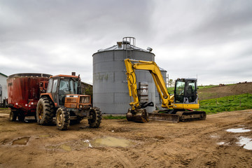farming tractor and excavator